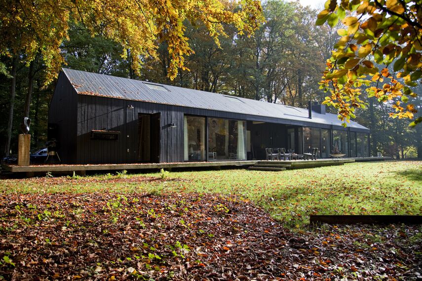 ConceptPatio 130 Coulissants, ConceptSystem 77 Fenêtres et ConceptWall 50 Murs rideaux - House The Brouwhuis situé à Oisterwijk, les Pays-Bas