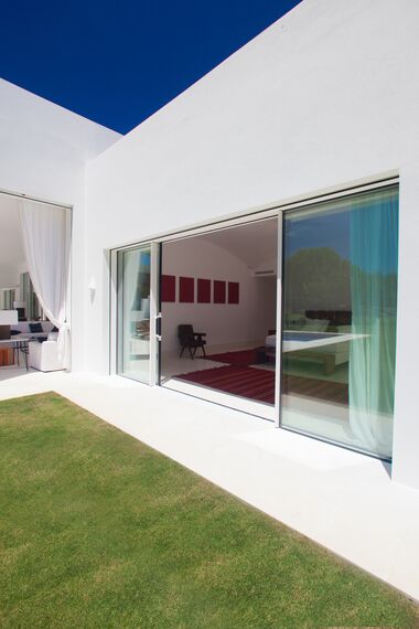 ConceptSystem 77 Doors, ConceptPatio 68 Sliding & Folding and HiFinity Sliding & Folding - Casa Las Palmeras located inSpain